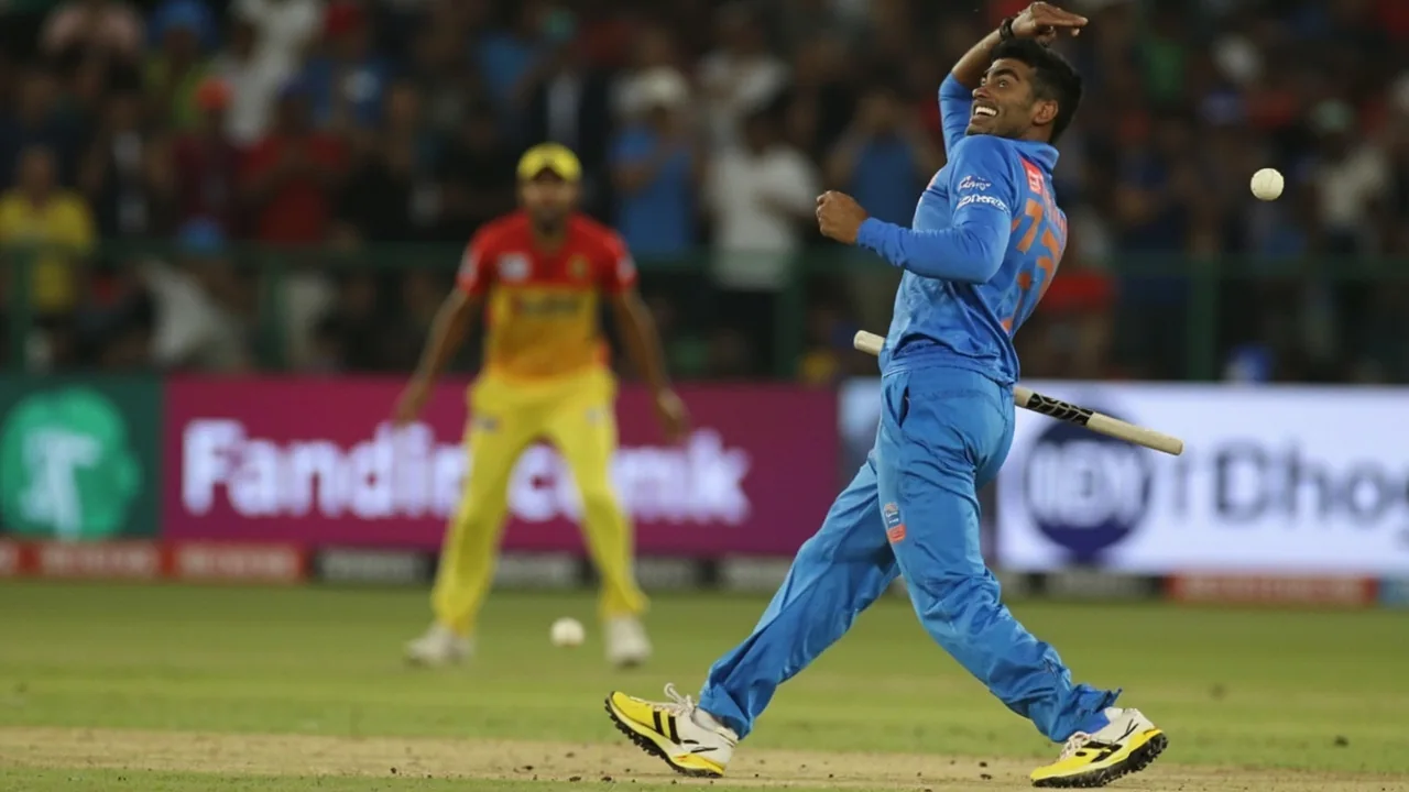 Close-up of a batter in an Indian blue T20 kit driving through the covers on the off side with the Harare outfield in soft focus behind him
